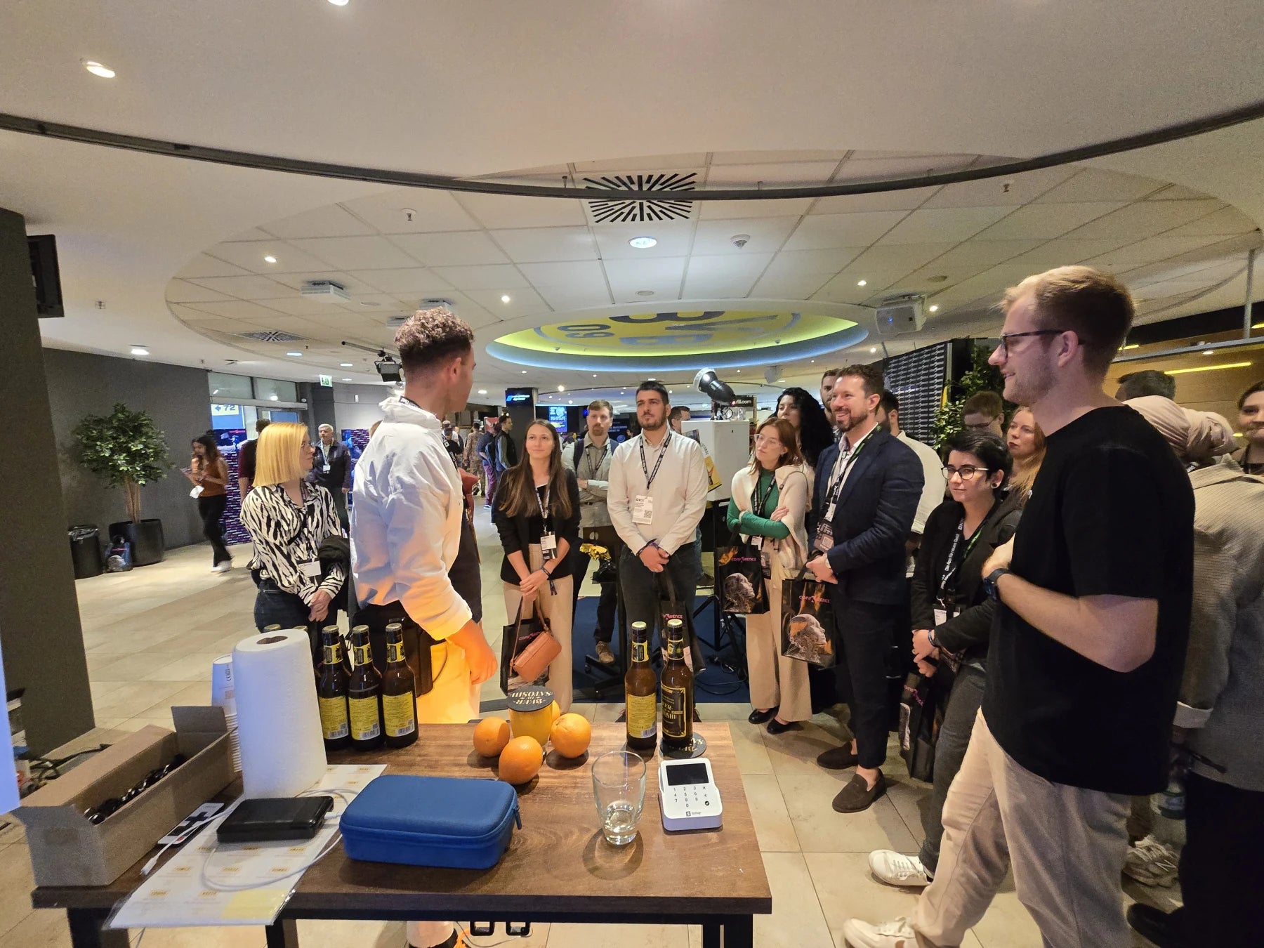 Beer of Satoshi speaking with visitors at CONF3RENCE Dortmund