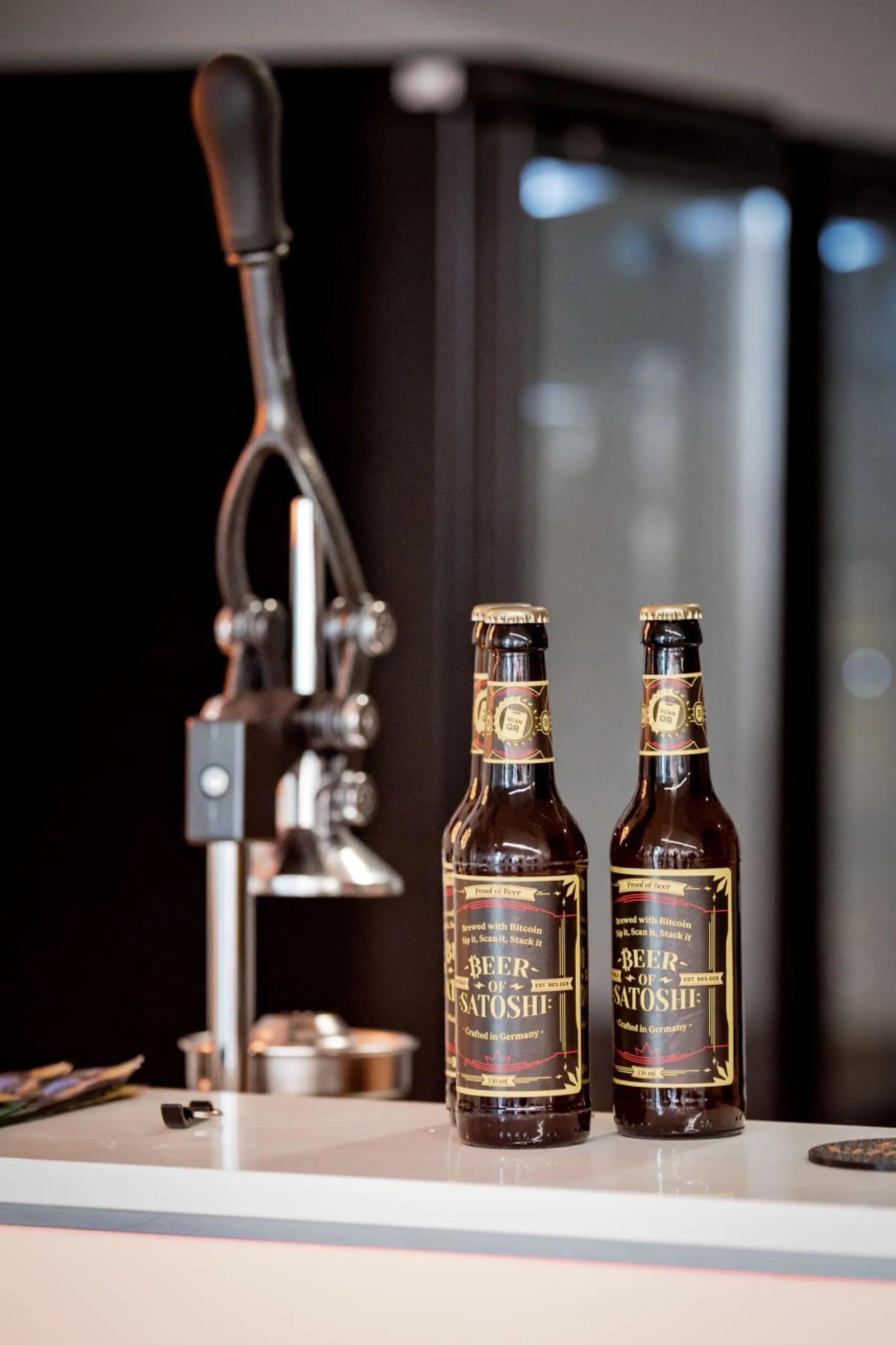 Beer of Satoshi bottles ready to be opened and shared
